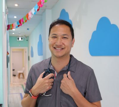 Colourful floors and ceilings adorn the interior of Thrive Kids Clinic in Toronto.