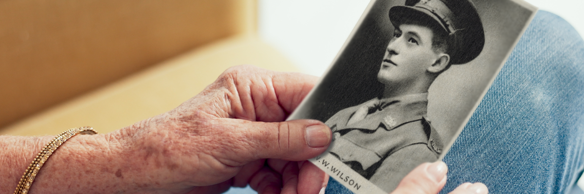 Hands holding a photo of Captain William Webster Wilson