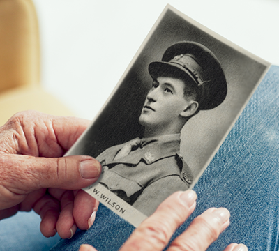 Hands holding a photo of Captain William Webster Wilson